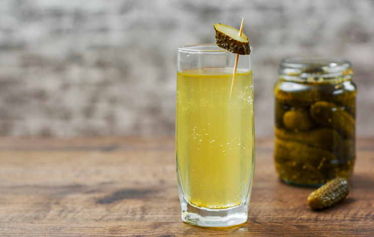 Glass of Pickle Juice | Foods that help with muscle cramps